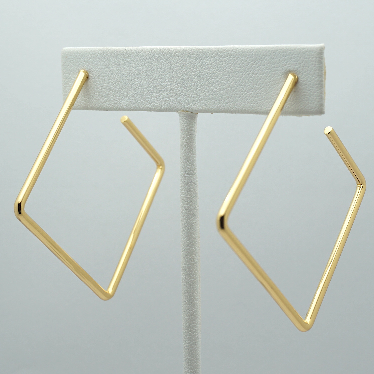 Square Hoop Earrings in Gold on Stand
