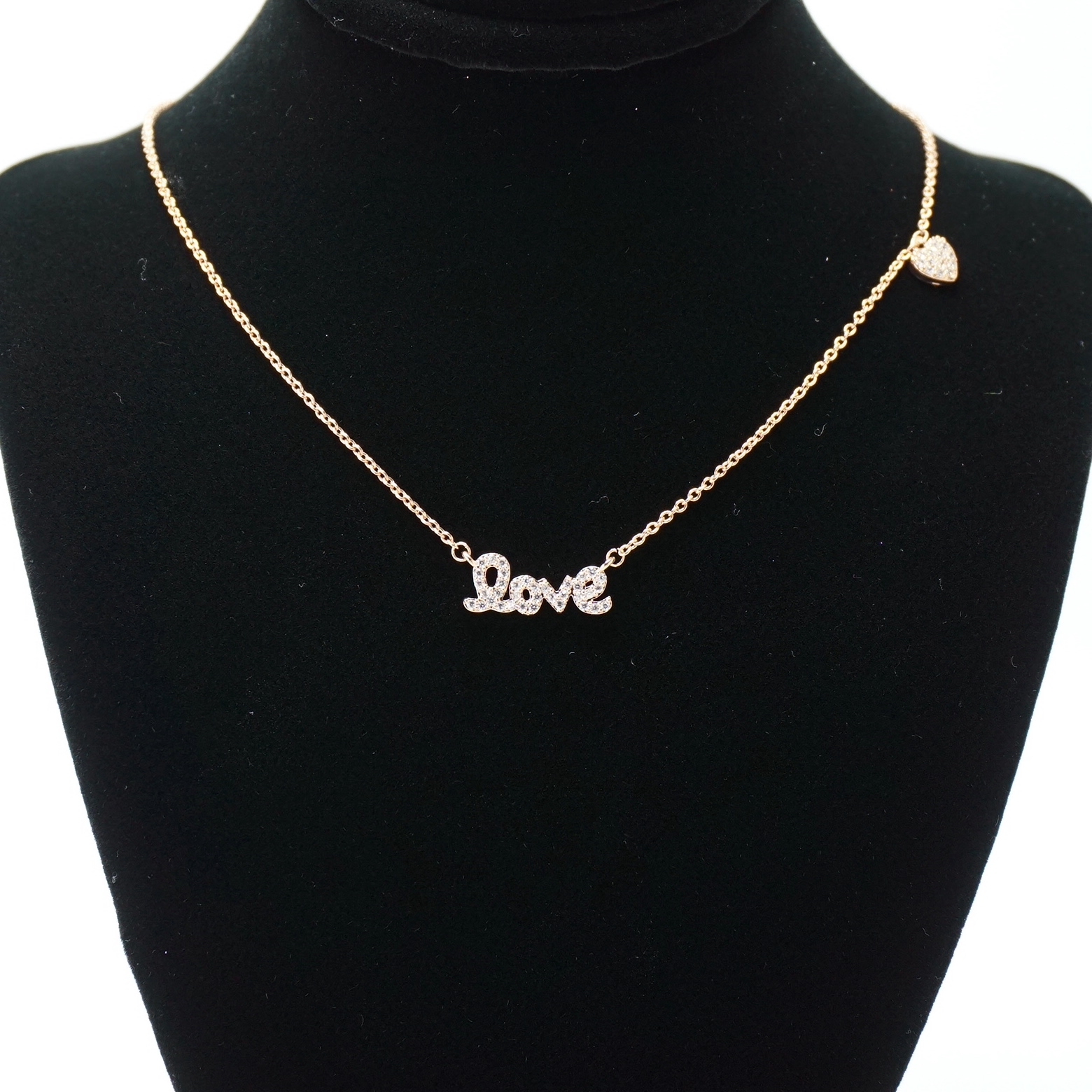 The Love Necklace in Rose Gold on Stand