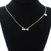 The Love Necklace in Silver on Stand