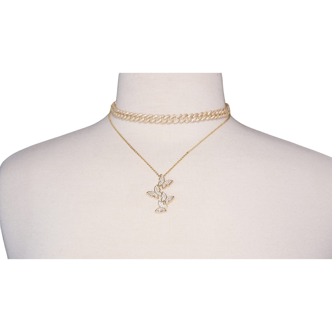 Gold Cuban Link Necklace and Gold 4 Butterfly Necklace on Stand