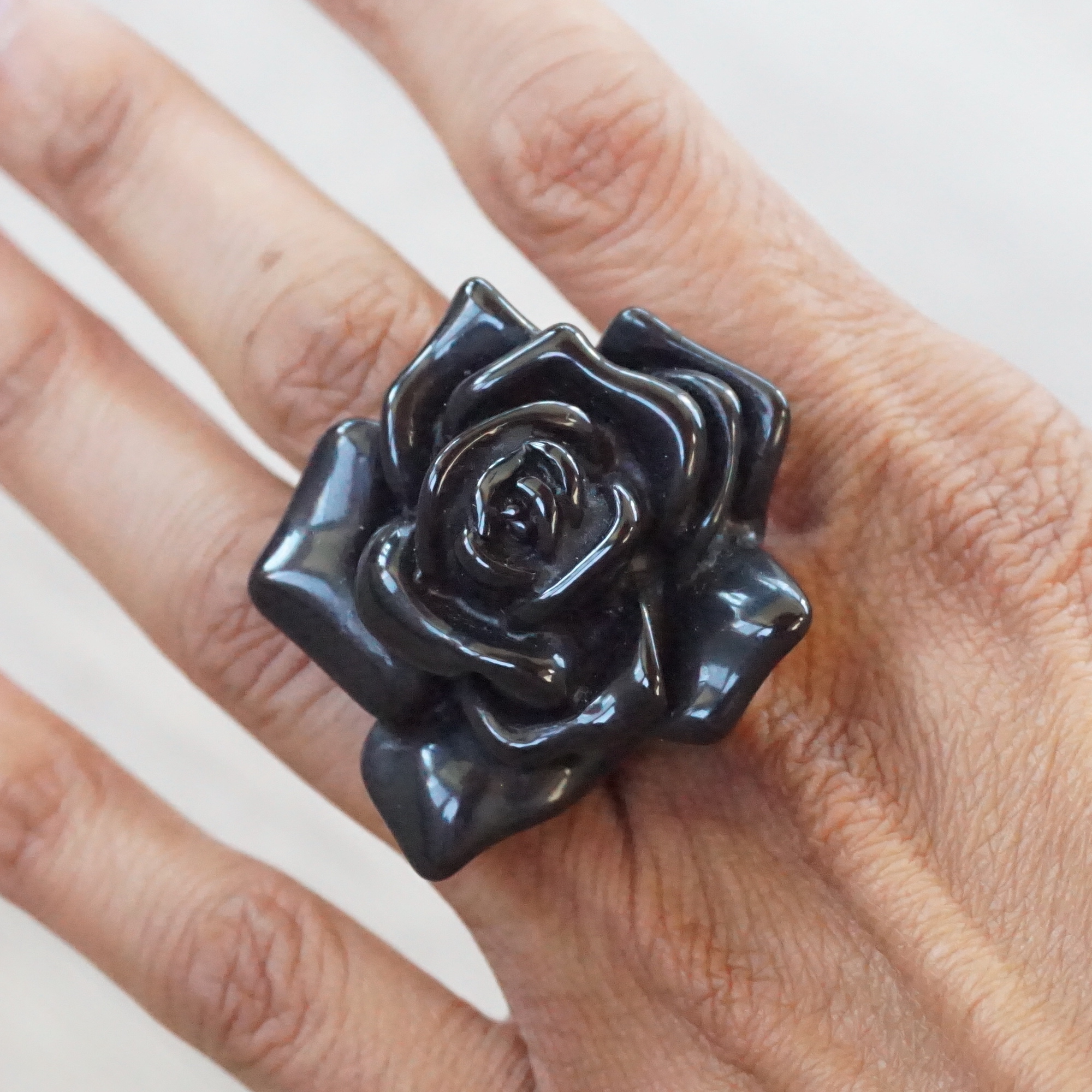 Acrylic Flower Ring in Black on Finger