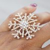 Crystal Snowflake Ring in Gold on Finger