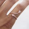 Spiral Drop Ring in Rose Gold on Finger