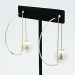 Abstract Pearl Drop Round Earrings in Gold on Stand