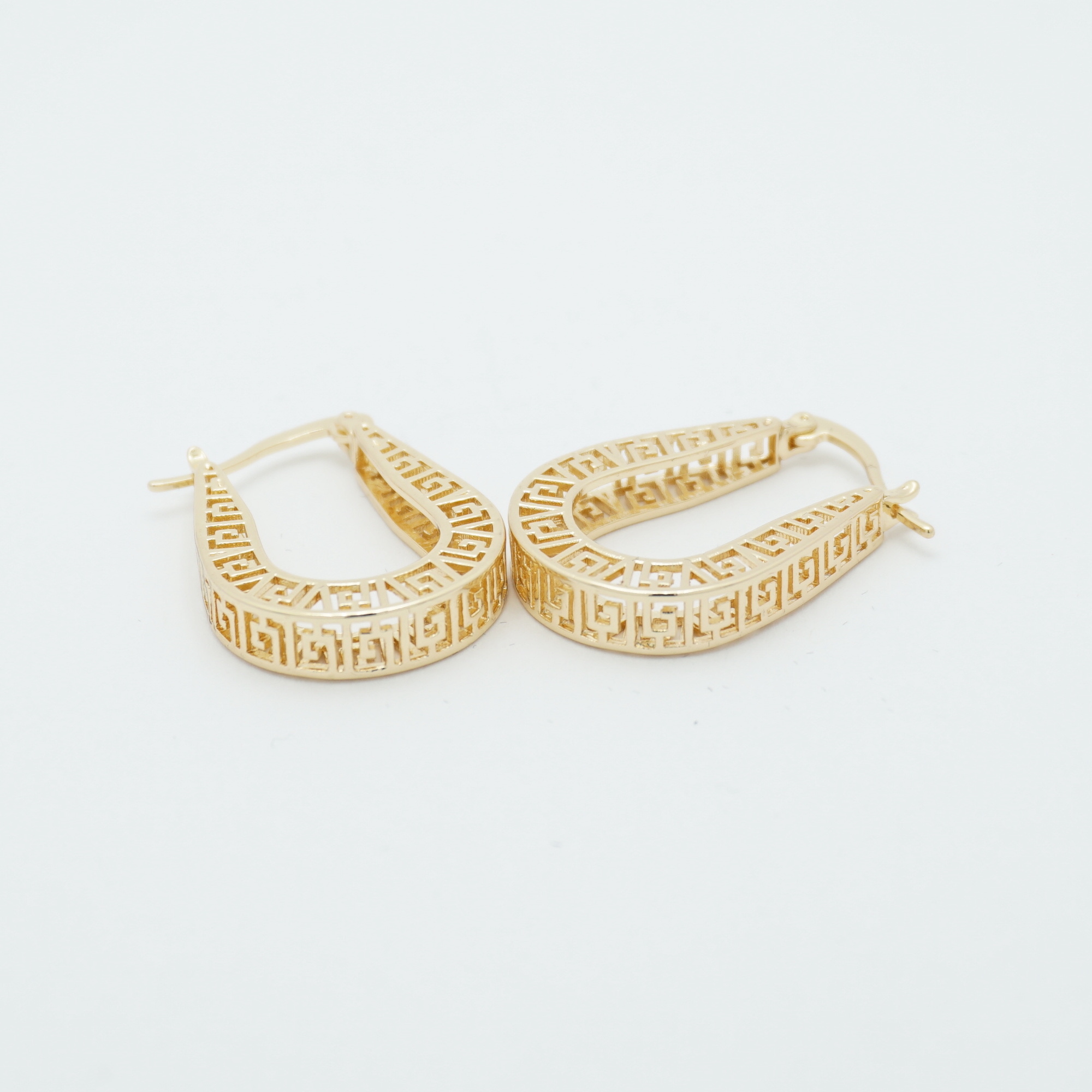 Cut Out Oval Hoop Earrings in Gold