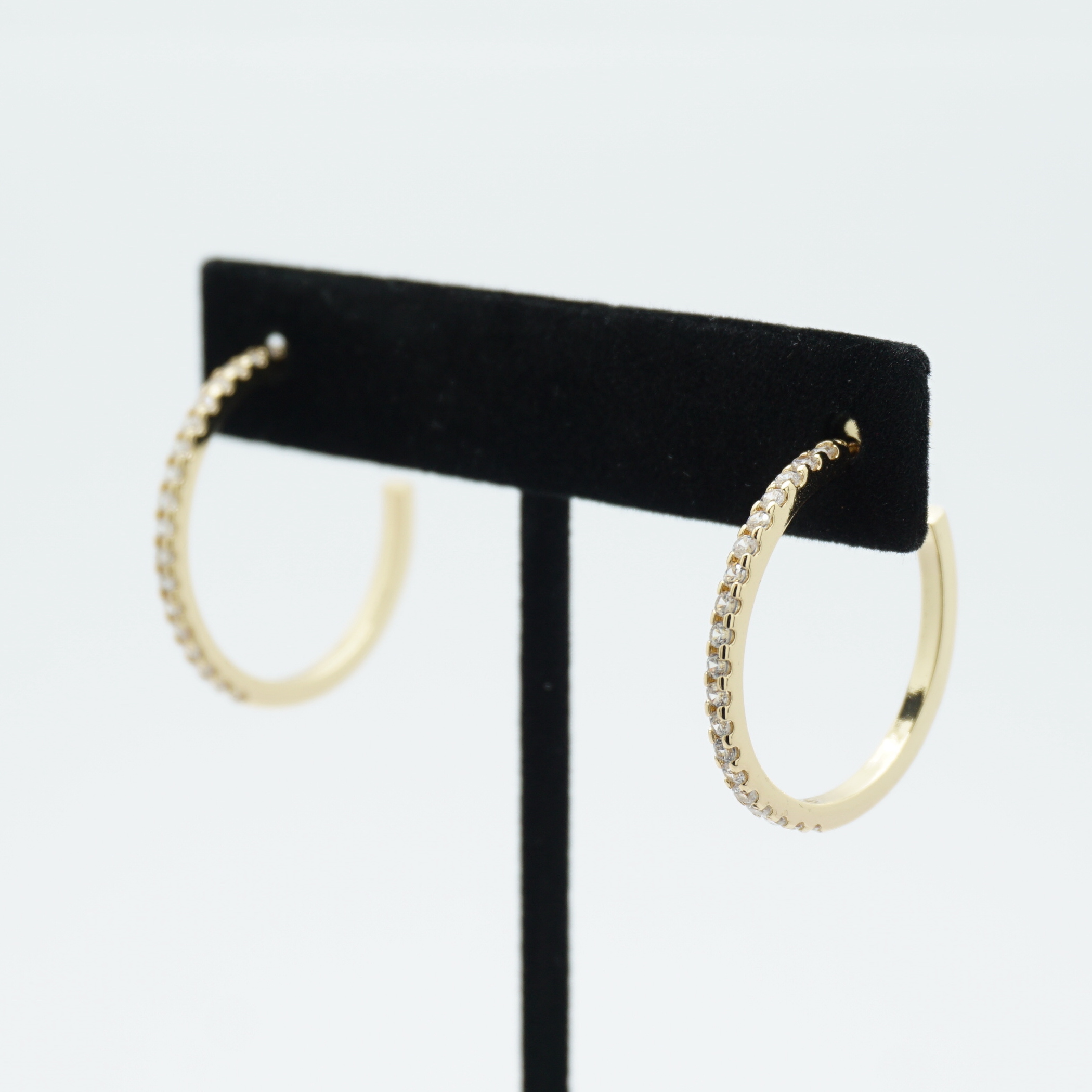 Skinny Crystal Hoop Earrings Medium in Gold on Stand