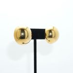 Pierced Large Button Stud Earrings in Gold on Earrings Stand